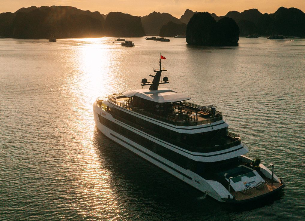 Sunshine Golden Cruises ship sailing through Lan Ha Bay, Cat Ba